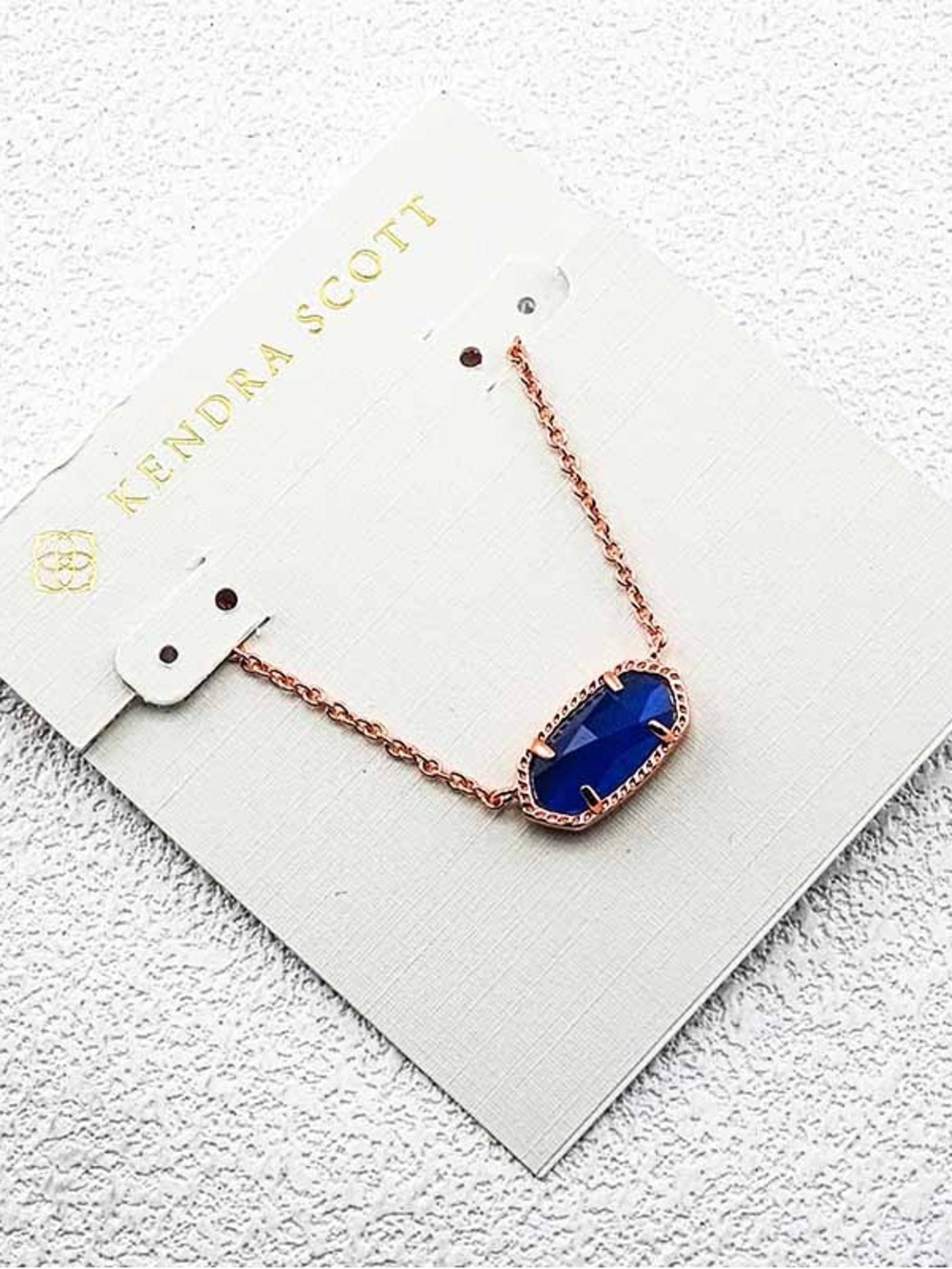 Kendra Scott Rose Gold Necklace with Deep Blue Stone